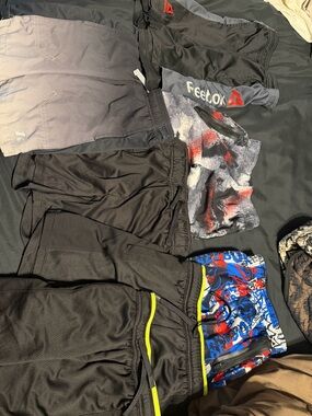Reebok Black Shorts with Red and Blue Accents